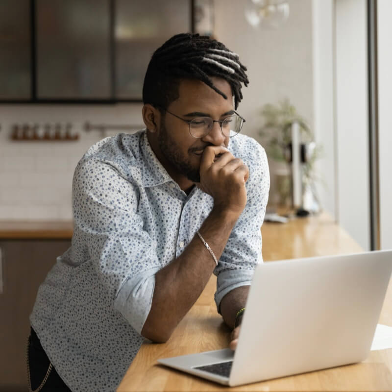 young man watching the success with autism webinar