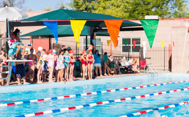 group of women doing yoga in rec center