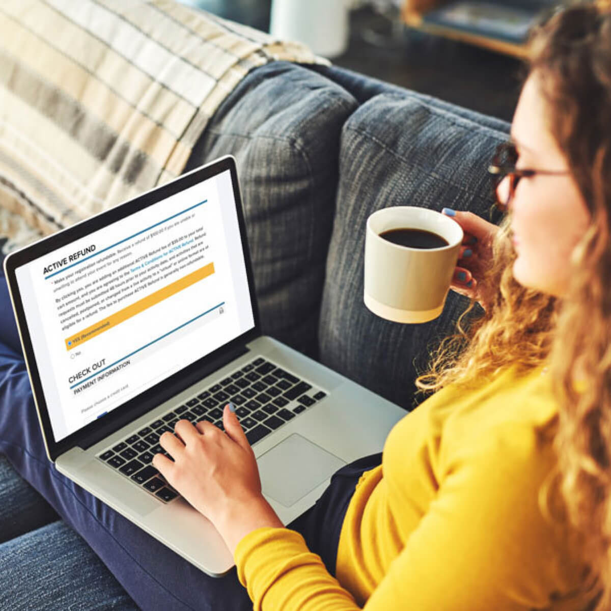 women on couch adding active refund at checkout